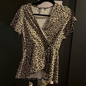Brown cheetah top, side medium, never worn.